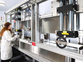 AMRC technical lead, Robyn Elliott, evaluating the thermoplastic tape processing capability at Cygnet Texkimp.