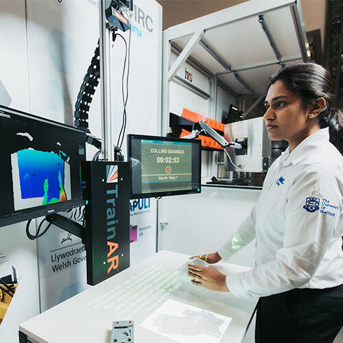 An engineers looking at over data at a smart bench
