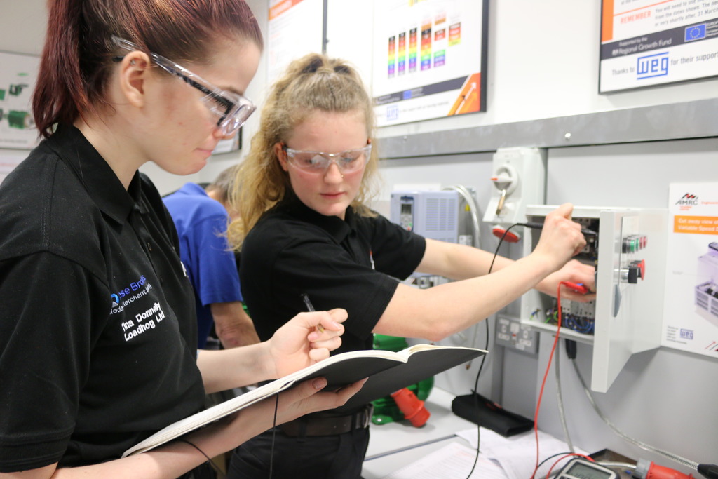 Bright sparks: Tina Donnelly, an apprentice with Loadhog Ltd, and Amy Brown, an apprentice with RE Field Services, pictured in the AMRC Training Centre electrical workshop. 