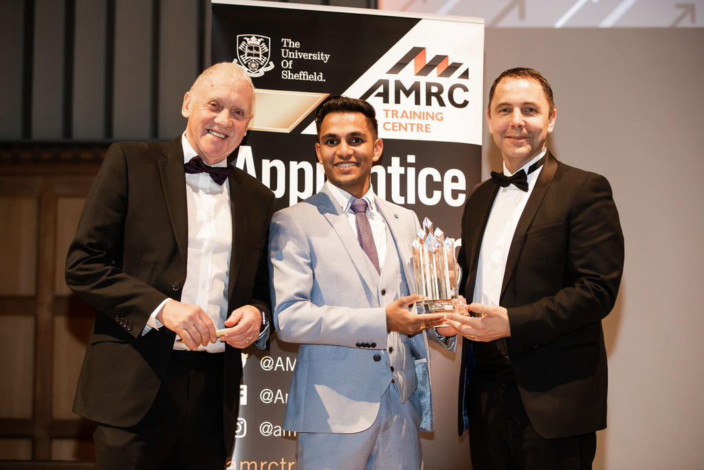 All smiles: Look North presenter and ceremony host for the evening Harry Gration with the overall Apprentice of the Year winner Shivan Morkar and Brian Holliday, managing director for Siemens Digital Factory.  