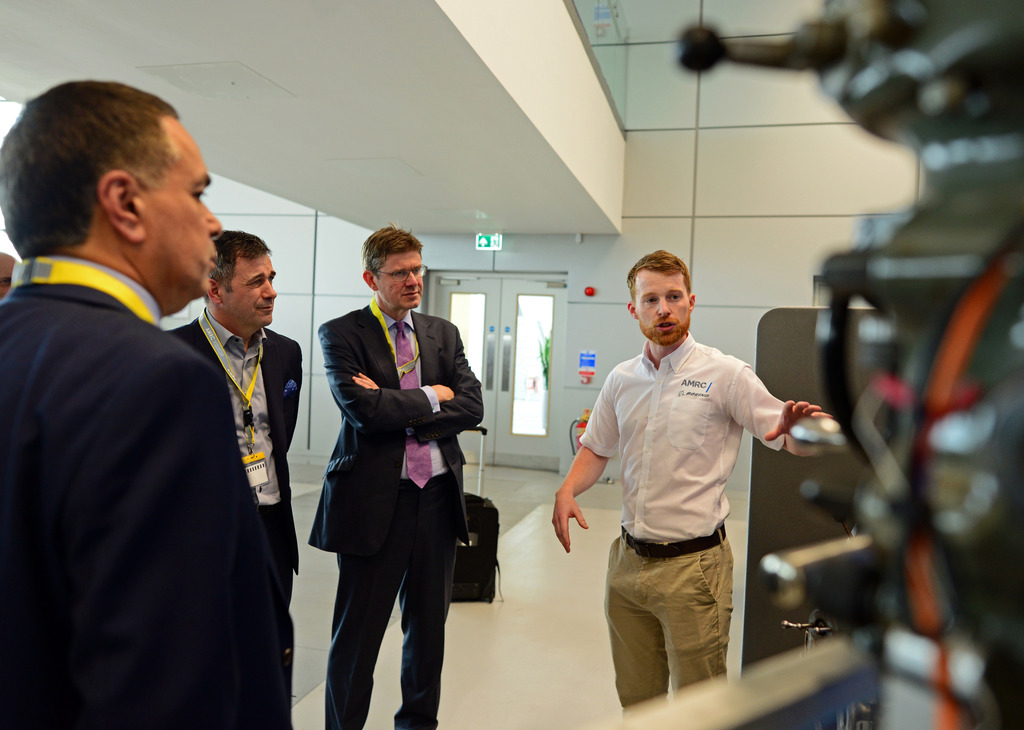 AMRC's Gavin Hill with Greg Clark, Juergen Maier and Hamid Mughal on their tour of Factory 2050.