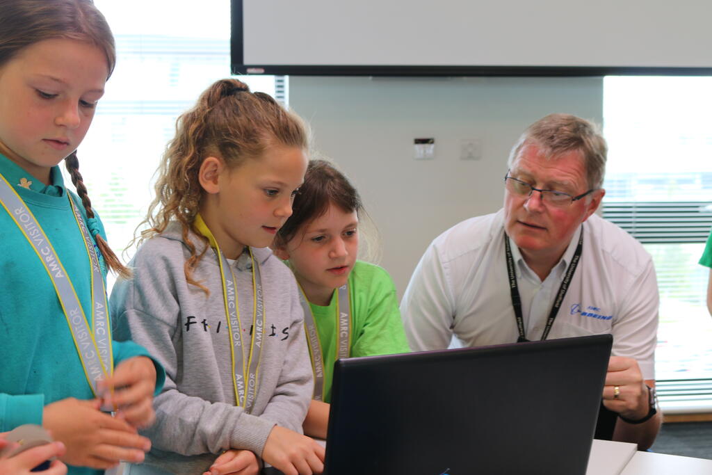 AMRC CEO Colin Sirett judging the primary school team racing cars. 