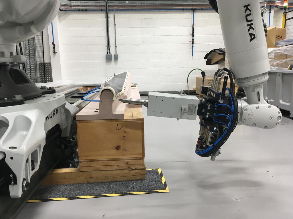 The AMRC’s KSL robot cell with ultrasonic knife attachment. KukaSim was used to work out the ideal position for the tool for the optimum cutting path.