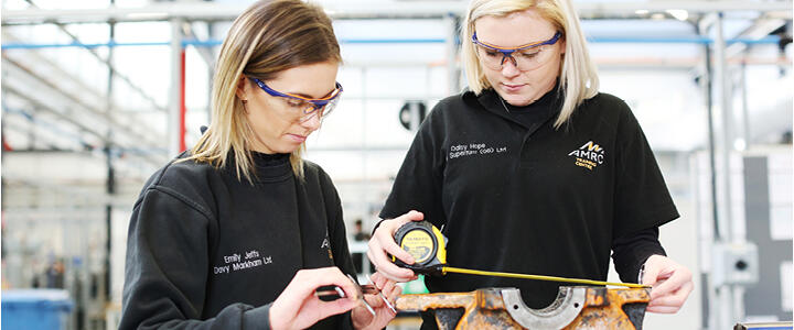 AMRC apprentices on the Training Centre workshop floor.