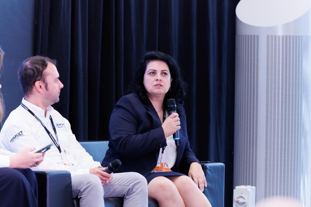 Evren Yasa, head of additive manufacturing, speaking on a panel at the AMRC Tech Fellows.